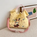 Detail of cartoon puppy embroidery and nice lettering on yellow quilted tote bag - Music Dog Yellow