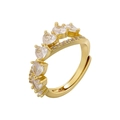 Detailed macro view of heart-cut clear zircons on gold-plated adjustable ring band - VJ515 Gold X Heart