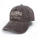 Detail of vintage washed denim baseball cap with California embroidery and stitched brim - Coffee