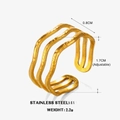 Adjustable golden stainless steel ring featuring a three-layer wavy design and hammered texture - Line Ring / Gold