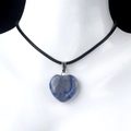 Blue lapis lazuli heart pendant necklace with black cord on mannequin display - Blue Aventurine