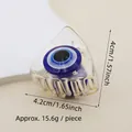 Detail view of small evil eye acrylic hair claw clip with 4.2cm by 4cm dimensions - 4.2cm Cat Ear Eye Claw Clip