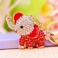 Golden elephant keychain featuring red enamel ears and sparkling crystal rhinestones - Single OPP Bag Packaging / Full Rhinestone Elephant Red
