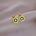 Macro shot of gold Roman numeral stud earrings with a central zircon on purple fabric - Roman Numeral Black Enamel (P401 Gold) / Gold