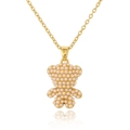 Close-up of a gold necklace featuring a bear pendant fully paved with white pearls - Pearl Pave Bear Style (AL-D1050)