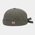 Detail view of dark green docker hat with white 'lit' embroidery and adjustable strap - Army Green