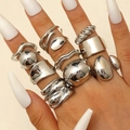 Detail eines 11-teiligen silbernen Ring-Sets mit Lava-Struktur und Wellendesign - Silberne Mode Geometrische Lavaringe (A-308)