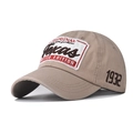 Close-up of Texas embroidery and 1932 detail on washed cotton baseball cap - Adjustable / Khaki