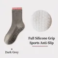 Dark gray yoga socks with pink cuffs and full silicone non-slip grip soles - One Size / Dark Gray