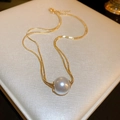 Single large white pearl pendant on a gold snake chain necklace in French retro style - Gold Snake Chain Large Pearl Necklace