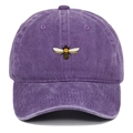 Detail of vintage washed purple baseball cap featuring a delicate bee embroidery pattern - Purple
