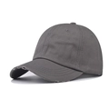 Detail of distressed brim and stitched eyelets on a dark grey washed cotton baseball cap - Adjustable / Gray
