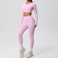 Pink yoga set featuring a long sleeve crop top and high waist leggings in studio setting - S / Top And Bottom / Sakura Pink