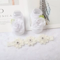 Detailed view of white baby socks with roses and lace headband with pearls and rhinestones - White Flower/Pearl Rhinestone