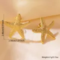 Detailed view of gold starfish earrings with textured surface and size specifications - Stainless Steel Satin Starfish