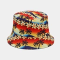 Detailed close-up of tropical palm tree sunset print on a reversible sun protection bucket hat - Color 2 / Sunset Gradient Tropical Print