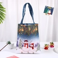 Detail view of snowman and pine branch print on a navy blue Christmas gift bag - Blue Snowman