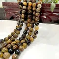 Polished natural tiger eye round beads strand with golden brown cat eye texture - Tiger Stone Ab27 / 6mm / Approx 63pcs