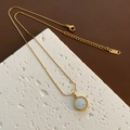 18K gold plated titanium necklace featuring a round white mother of pearl shell pendant - Titanium Steel / White Mother of Pearl Round Pendant / Gold