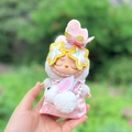 Labubu plush doll in pink dress with crown and star glasses, handheld close-up view - Jade Rabbit Pink Cheongsam Set / First And Second Generation Keychains Are Compatible With La Cloth Dolls. Dolls Not Included.