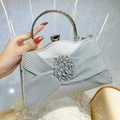 Silver rhinestone evening handbag with pleated design and circular metal top handle - Silver