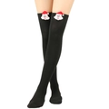 Detail of black over-knee Christmas stockings with Santa Claus plush figure decoration - One Size / Black