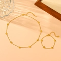 Elegante conjunto de joyas de acero inoxidable dorado con varios colgantes de corazón y pulsera - Conjunto de Collar y Pulsera de Corazón (B109-B108) / Dorado