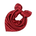 Close-up of vibrant red satin silk square scarf showing smooth texture and glossy shine - Burgundy