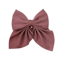 Close-up of a large dark pink silk ribbon bow hair clip with smooth fabric texture - Dark Pink
