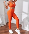 Set yoga da donna due pezzi arancione brillante con reggiseno sportivo e leggings a coste - Arancione