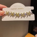 Detail of silver bracelet featuring yellow marquise zircons and white round crystals - 41# Bracelet - Silver - Yellow