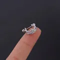 Silver double layer ear bone stud with micro-paved zircons shown on a fingertip - Double Layer Circle Style (315-3#S) / Silver