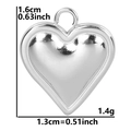 Silver heart pendant detail showing dimensions of 1.6cm height and 1.4g weight - Steel