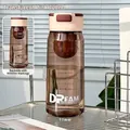 Sleek 700ml semi-transparent pink tea water bottle with handle and scale markings - Pink