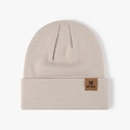 Oatmeal knit beanie with folded brim and brown faux leather square logo label - One Size / Khaki Yellow