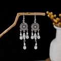 Bohemian silver tassel earrings with white beads and pearls hanging on a wood branch - Silver + Milky White Beads Tassel (E5808-3/White)