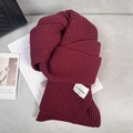 Solid burgundy chunky knit scarf with white label for winter warmth and cozy style - Approx. 160cm / Angola Red