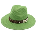 Detailed shot of green straw fedora hat featuring leopard print band and pearl flower accents - Green