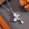 Detail of silver bow pendant necklace with sparkling zircons in a wooden jewelry box - Silver Full Diamond V-Shape Bowknot Necklace