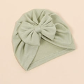 Light green baby turban hat with a large bow in soft ribbed knit fabric for summer - Bean Green