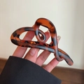 Detail of tortoise shell heart cutout hair claw clip made of premium resin material - Tortoiseshell Heart Claw Clip
