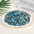 Polished natural blue apatite tumbled stones displayed in a white ceramic dish - 100 Grams Of Apatite (9-12mm)