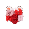 Pink and red bow hairpins with pom-poms and fabric flowers on bear card display - Pink & Red Series