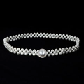 Detailed view of woven white pearls with a central rhinestone encrusted round buckle - Round Pave Rhinestone Pearl Buckle (款式3)