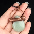 Handmade drop pendant with light green natural stone and antique bronze wire wrap - Green Aventurine
