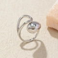 Macro shot of silver polished irregular ring with oversized mirror sphere detail - Adjustable Open / Silver Sphere Wrap
