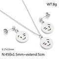 Conjunto de joyas de acero inoxidable plateado con colgantes de caritas sonrientes caladas - Color Acero