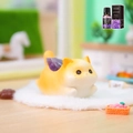 Cute cream-orange cat figurine with a purple crystal stone on a soft white carpet - 1244-1 Orange Cat with Amethyst and Oil
