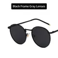 Retro round frame sunglasses for women featuring matte black frames and grey lenses - Black Frame Grey Lens