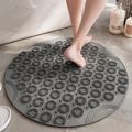 Gray round TPE bath mat with non-slip suction cups and massage texture on surface - Gray